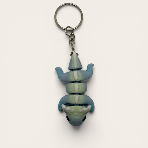 L3D Prints articulated rainbow axolotl keychain, 3D printed with colour-changing filament, flexible and fun fidget toy.